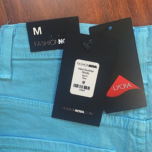 NEW WITH TAGS FASHIONNOVA BLUE FRILL HIGH RISE RIPPED JEAN SHORTS SIZE MEDIUM - Picture 2 of 6